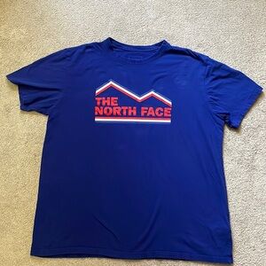 Men’s The North Face T-shirt. Very blue. With logo on the front and back.XL